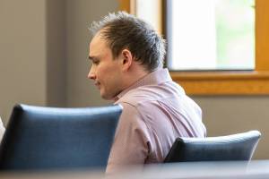 Christian Sayre sits in the courtroom before the start of jury selection on Tuesday, April 29, 2025 in Everett, Washington. (Olivia Vanni / The Herald)