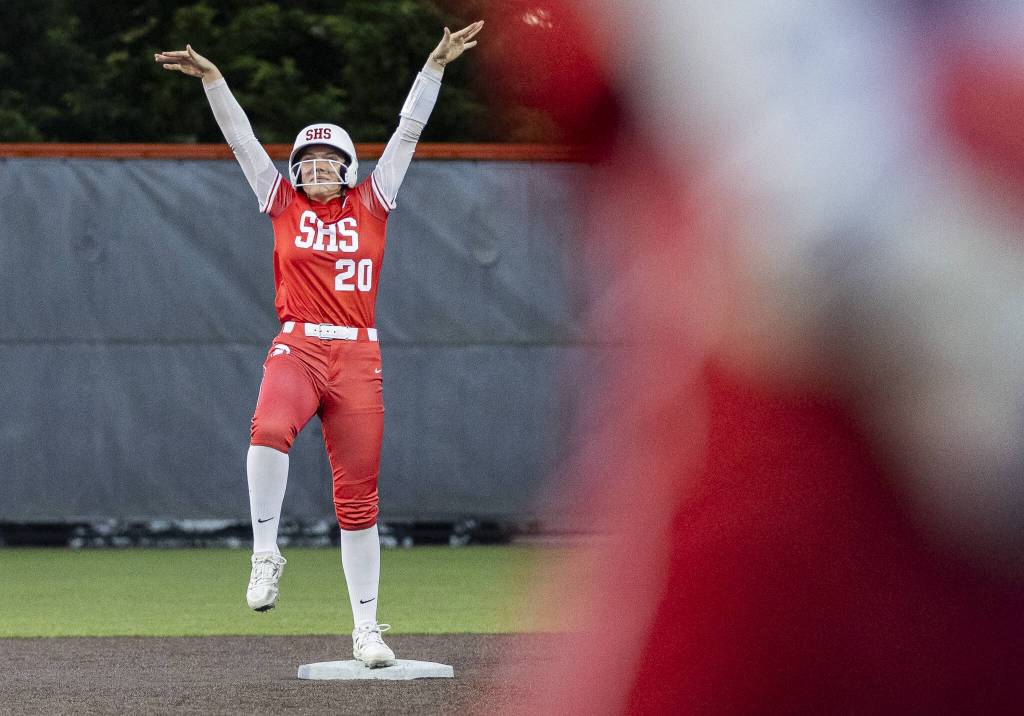 Stanwoods Addi Anderson poses on second base after getting a hit during the game against Monroe on Thursday, May 1, 2025 in Monroe, Washington. (Olivia Vanni / The Herald)