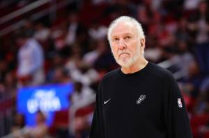 Head coach Gregg Popovich of the San Antonio Spurs looks on against the Houston Rockets during the first half of a preseason game at Toyota Center on Oct. 17, 2024, in Houston, Texas. (Alex Slitz / Getty Images / Tribune News Services)