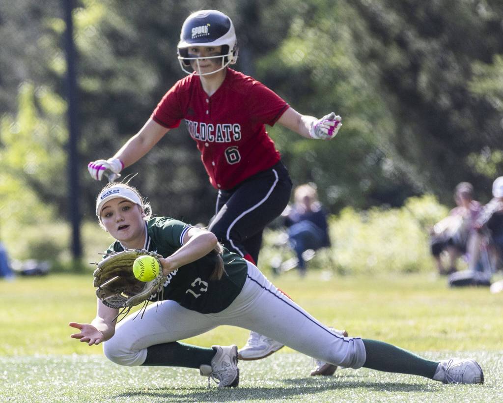 Edmonds-Woodways Ella Campbell dives to make a catch during the game against Archbishop Murphy on Monday, May 5, 2025 in Everett, Washington. (Olivia Vanni / The Herald)