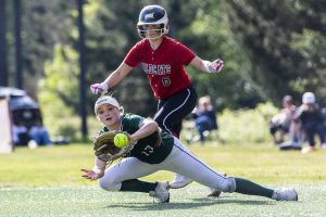 Edmonds-Woodway’s Ella Campbell dives to make a catch during the game against Archbishop Murphy on Monday, May 5, 2025 in Everett, Washington. (Olivia Vanni / The Herald)