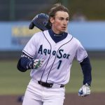 Everett AquaSox infielder Colt Emersons helmet falls off as he runs to third base after a fielding error during the game against the Tri-City Dust Devils on Tuesday, May 6, 2025 in Everett, Washington. (Olivia Vanni / The Herald)
