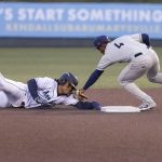 Everett AquaSox infielder Michael Arroyo is tagged out as he slides past second base during the game against the Tri-City Dust Devils on Tuesday, May 6, 2025 in Everett, Washington. (Olivia Vanni / The Herald)