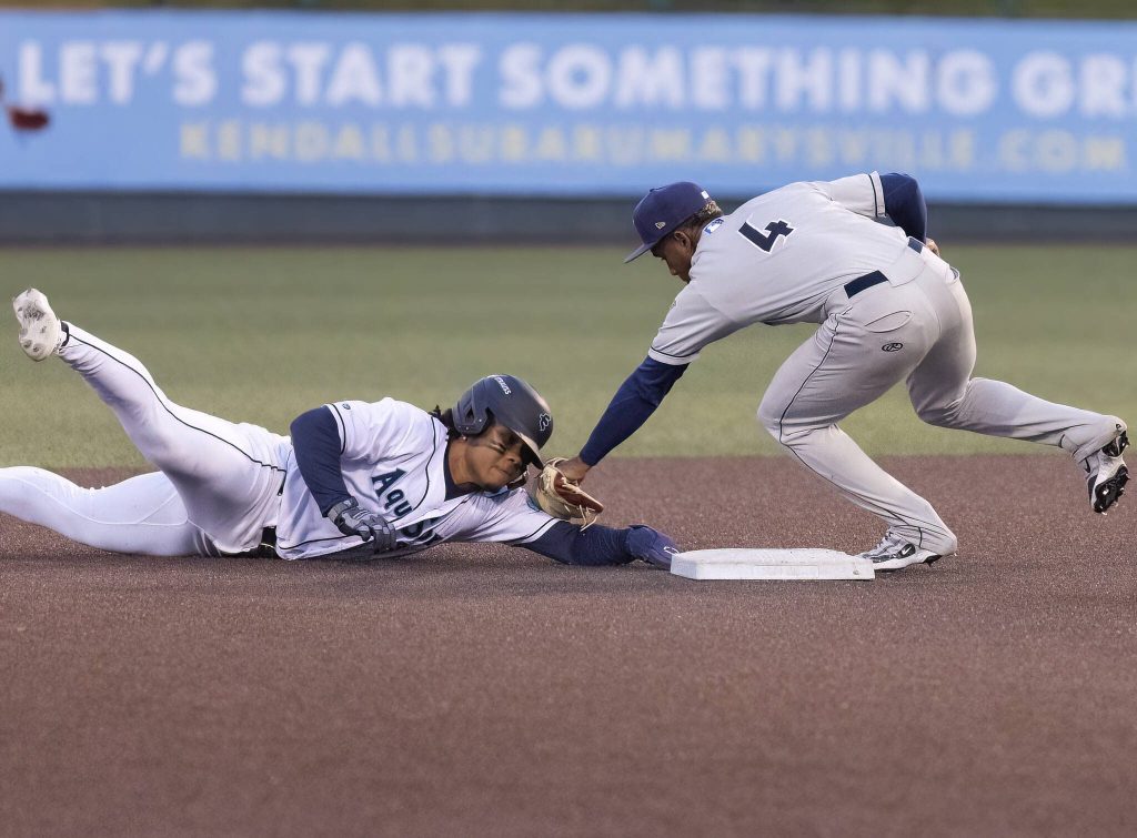 Everett AquaSox infielder Michael Arroyo is tagged out as he slides past second base during the game against the Tri-City Dust Devils on Tuesday, May 6, 2025 in Everett, Washington. (Olivia Vanni / The Herald)