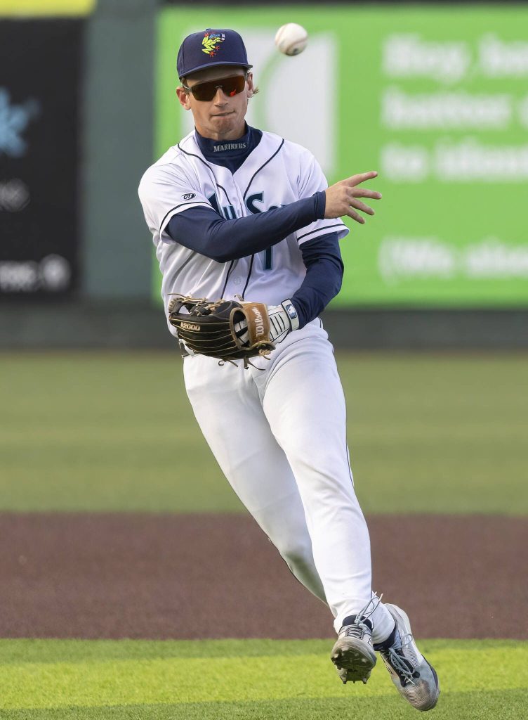 Everett AquaSox infielder Colt Emerson throws the ball to first base during the game against Tri-City Dust Devils on Tuesday, May 6, 2025 in Everett, Washington. (Olivia Vanni / The Herald)