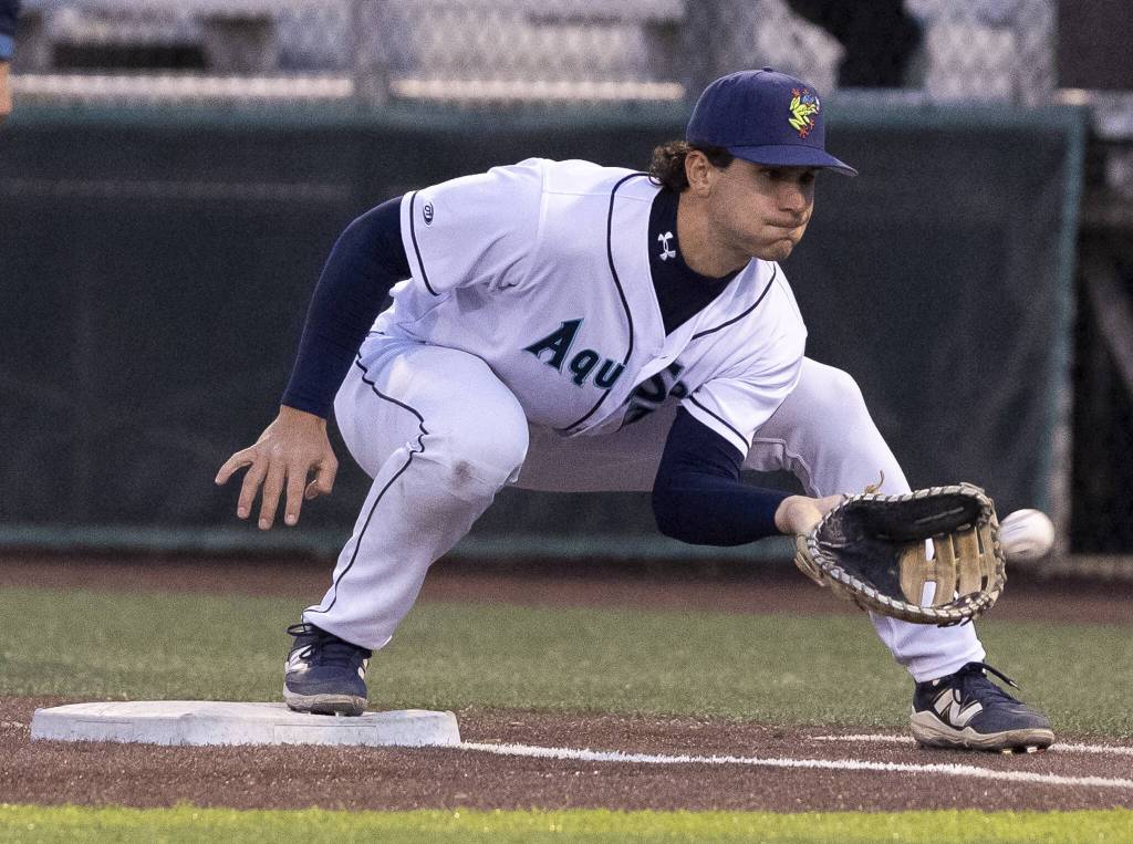 Everett AquaSox infielder Charlie Pagliarini makes a catch at first base for an out during the game against the Tri-City Dust Devils on Wednesday, May 7, 2025 in Everett, Washington. (Olivia Vanni / The Herald)