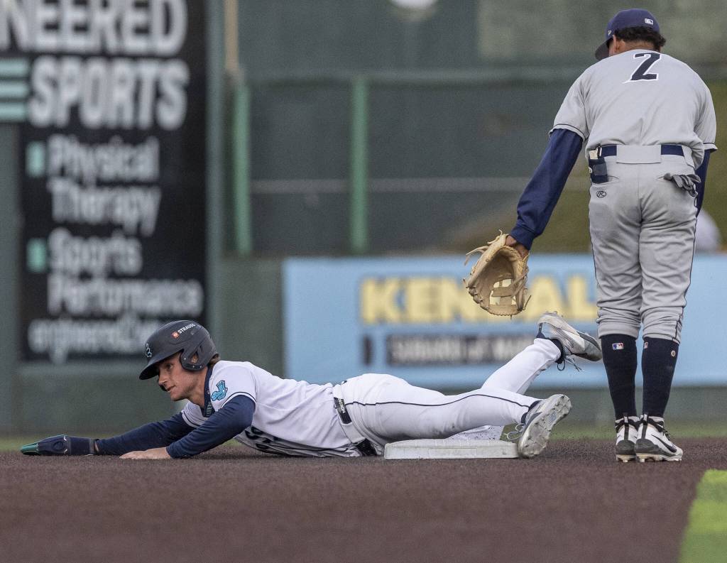 Everett AquaSox infielder Colt Emerson slides into second base during the game against the Tri-City Dust Devils on Wednesday, May 7, 2025 in Everett, Washington. (Olivia Vanni / The Herald)