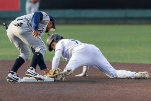 Everett AquaSox outfielder Tai Peete looks back at his foot after sliding into second base during the game against the Tri-City Dust Devils on Wednesday, May 7, 2025 in Everett, Washington. (Olivia Vanni / The Herald)