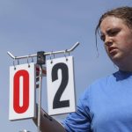 Shorewoods Rylie Gettmann updates the score during a Class 3A District 1 girls tennis tournament at Snohomish High School in Snohomish, Washington on Wednesday, May 15, 2024. (Annie Barker / The Herald)