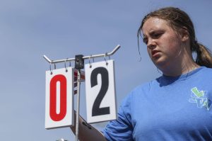 Shorewood's Rylie Gettmann updates the score during a Class 3A District 1 girls tennis tournament at Snohomish High School in Snohomish, Washington on Wednesday, May 15, 2024.  (Annie Barker / The Herald)