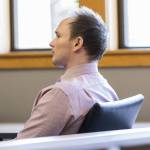 Christian Sayre listens to closing statements during his trial at the Snohomish County Courthouse on Thursday, May 8, 2025 in Everett, Washington. (Olivia Vanni / The Herald)