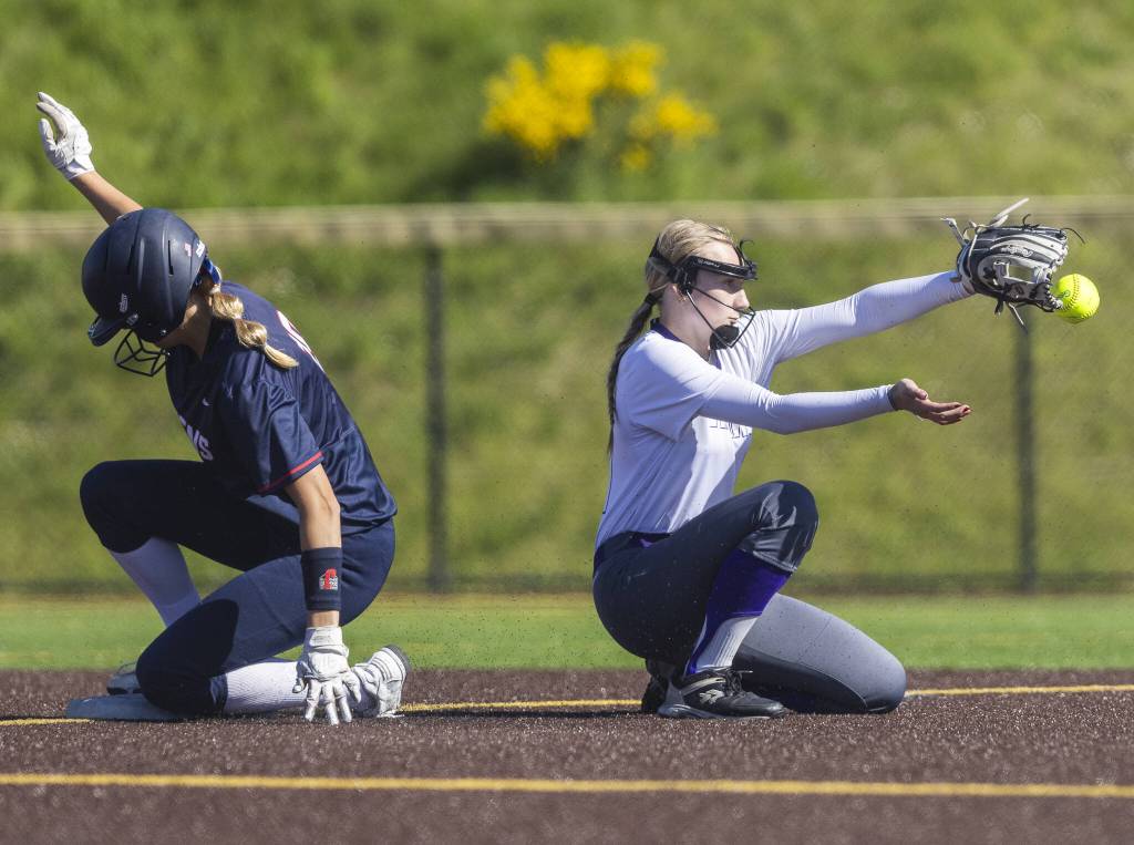 Lake Stevens Reese Breckenridge make a catch at second base during the game against Juanita on Monday, May 12, 2025 in Everett, Washington. (Olivia Vanni / The Herald)