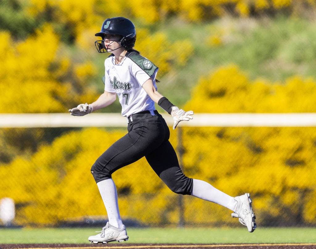 Jacksons Clara Stone runs to second base during the game on Monday, May 12, 2025 in Everett, Washington. (Olivia Vanni / The Herald)
