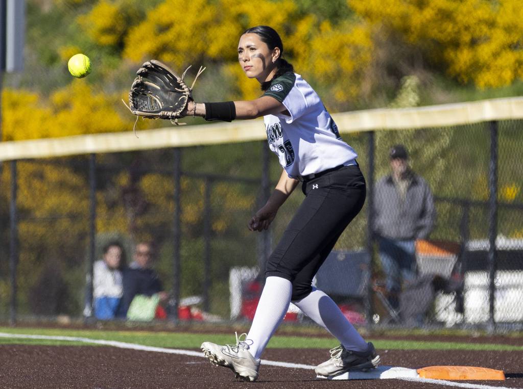 Jacksons Alana Banog catches the ball at first base during the game on Monday, May 12, 2025 in Everett, Washington. (Olivia Vanni / The Herald)