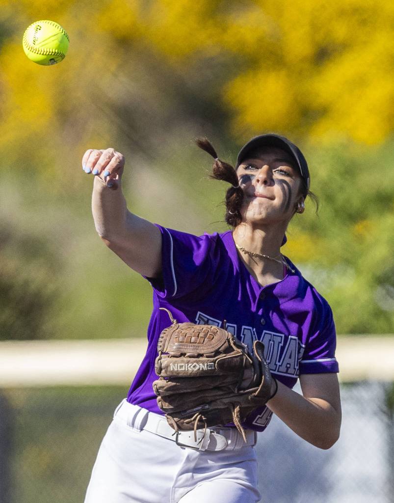 Kamiaks Emma Stansfield throws the ball to first base during the game against North Creek on Monday, May 12, 2025 in Everett, Washington. (Olivia Vanni / The Herald)