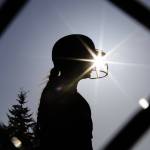 A Glacier Peak player warms up before stepping up to bat during the game against Issaquah on Monday, May 12, 2025 in Everett, Washington. (Olivia Vanni / The Herald)