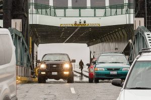 Commuters from Whidbey Island disembark their vehicles from the ferry Tokitae on Wednesday, Feb. 28, 2018 in Mukilteo, Wa.  (Andy Bronson / The Herald)