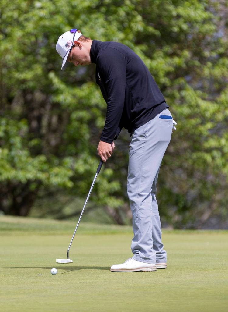 Lake Stevens Joshua Ament putts during the 4A District 1 Boys Golf Championship at Legion Memorial Golf Course on Tuesday, May 13, 2025 in Everett, Washington. (Olivia Vanni / The Herald)