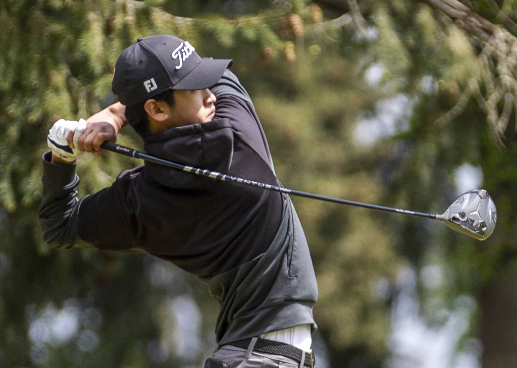 Jacksons Jacob Kang hits a drive during the 4A District 1 Boys Golf Championship at Legion Memorial Golf Course on Tuesday, May 13, 2025 in Everett, Washington. (Olivia Vanni / The Herald)