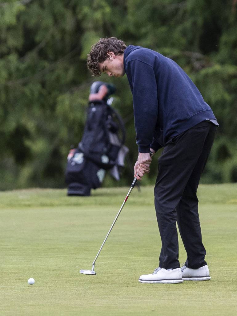 Everetts Sam Nelson putts during the 3A District 1 Boys Golf Championship at Legion Memorial Golf Course on Tuesday, May 13, 2025 in Everett, Washington. (Olivia Vanni / The Herald)