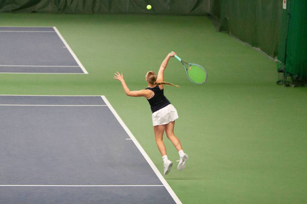 Glacier Peaks Alyssa Box serves during the District 1 4A doubles championship match on May 14, 2025 at Mill Creek Tennis Club. (Qasim Ali / The Herald)