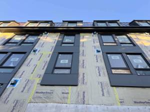 An apartment building under construction in Olympia, Washington in January 2025. (Photo by Bill Lucia/Washington State Standard)