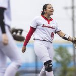 Snohomishs Amelie Lopez yells to pitcher Abby Edwards between pitches during the 3A District 1 consolation game against Edmonds-Woodway on Thursday, May 15, 2025 in Snohomish, Washington. (Olivia Vanni / The Herald)
