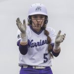 Edmonds-Woodways Ellie Alderson claps after making it to third base during the 3A District 1 consolation game against Snohomish on Thursday, May 15, 2025 in Snohomish, Washington. (Olivia Vanni / The Herald)