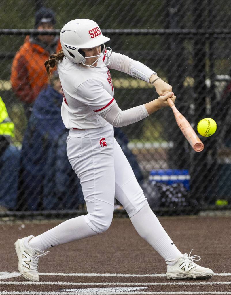 Stanwoods Addi Anderson gets a hit during the 3A District 1 championship game against Sedro-Woolley on Thursday, May 15, 2025 in Everett, Washington. (Olivia Vanni / The Herald)