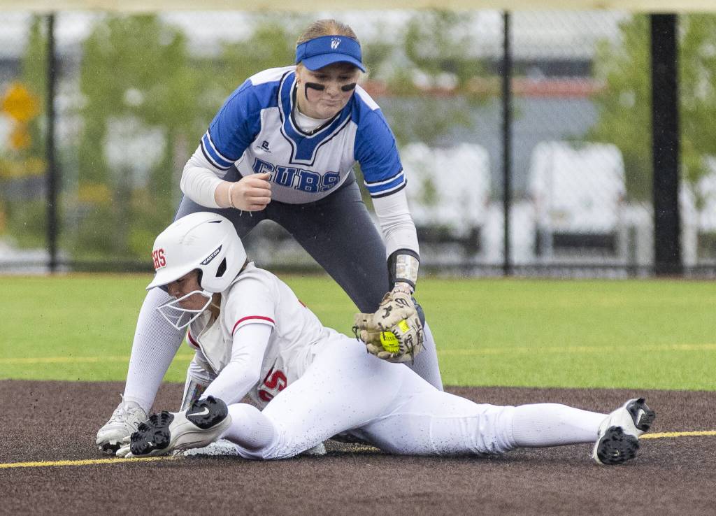 Stanwoods Reagan Ryan slides into second base during the 3A District 1 championship game against Sedro-Woolley on Thursday, May 15, 2025 in Everett, Washington. (Olivia Vanni / The Herald)