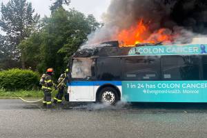 First responders extinguish a fire on a Community Transit bus on Friday, May 16, 2025 in Snohomish, Washington (Snohomish County Fire District 4)