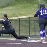 Jacksons Alana Banog gets an out at first base during the 4A District 1 game against Lake Stevens on Friday, May 16, 2025 in Everett, Washington. (Olivia Vanni / The Herald)