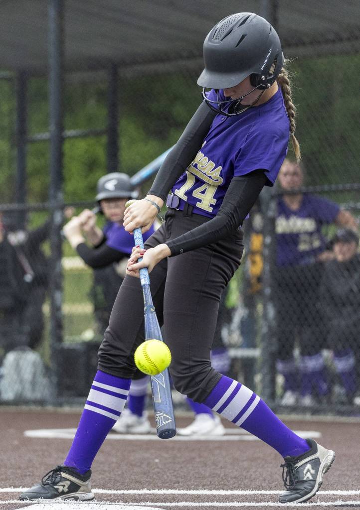Lake Stevens Reese Breckenridge gets hit during the 4A District 1 game against Jackson on Friday, May 16, 2025 in Everett, Washington. (Olivia Vanni / The Herald)