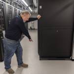 Snohomish County 911 Executive Director Kurt Mills shows some of the earthquake preparedness adaptations made in the server room of the new Snohomish County 911 building on Tuesday, May 20, 2025 in Everett, Washington. (Olivia Vanni / The Herald)
