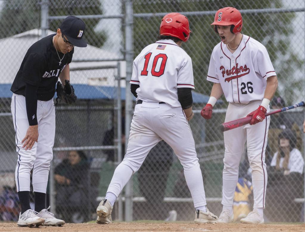 Snohomishs Dylan Hutchinson yells as teammate Enzo Porletto scores during the opening round 3A state game against Bellevue on Tuesday, May 20, 2025 in Snohomish, Washington. (Olivia Vanni / The Herald)