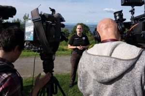 Natalie Given, an Everett Police Department spokesperson, speaks to members of the media at Harborview Park on Wednesday, May 21 in Everett, Washington. (Will Geschke / The Herald)