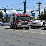 A fatal collision involving two vehicles and a motorcycle shut down Evergreen Way for several hours on Thursday afternoon. (Everett Fire Department)