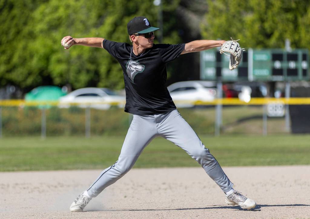 Jacksons Lucas Poindexter makes a throw from third base during practice on Wednesday, May 28, 2025 in Mill Creek, Washington. (Olivia Vanni / The Herald)