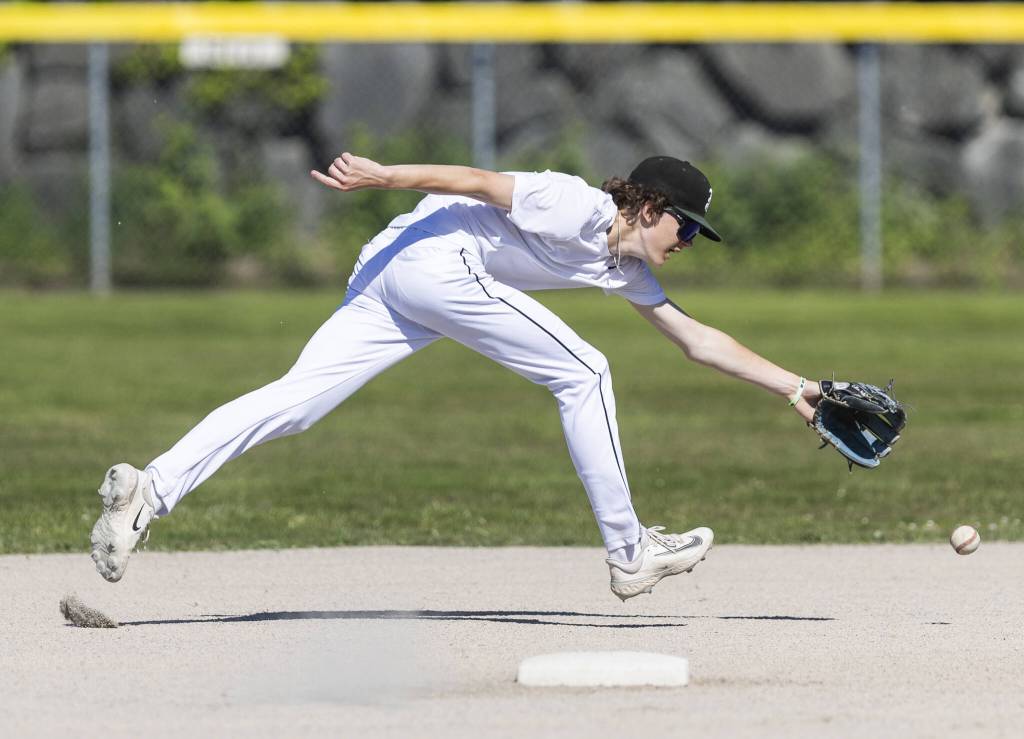 Jacksons Colton White reaches out for a ball during practice on Wednesday, May 28, 2025 in Mill Creek, Washington. (Olivia Vanni / The Herald)