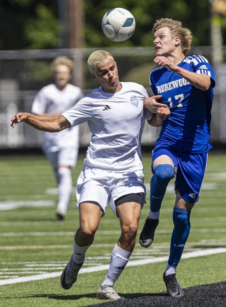 Shorewoods Julian Shook jumps to head the ball during the 3A state semifinal game against Ingraham on Friday, May 30, 2025 in Puyallup, Washington. (Olivia Vanni / The Herald)