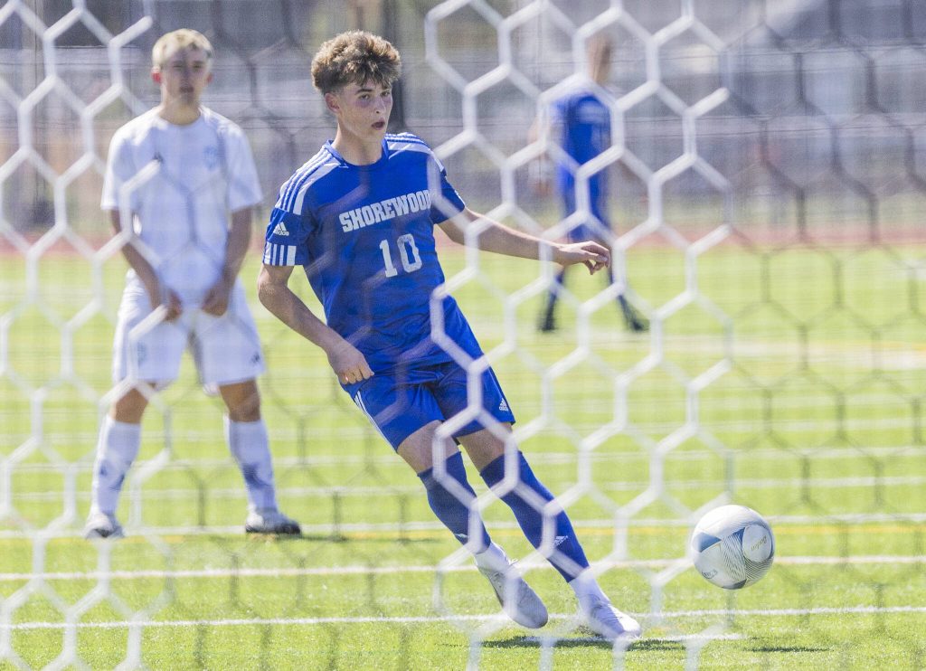 Shorewoods Niki Genadiev takes a penalty kick during the 3A state semifinal game against Ingraham on Friday, May 30, 2025 in Puyallup, Washington. (Olivia Vanni / The Herald)