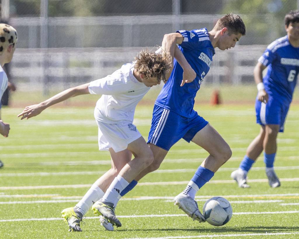 Shorewoods Daniel Bruno dribbles the ball during the 3A state semifinal game against Ingraham on Friday, May 30, 2025 in Puyallup, Washington. (Olivia Vanni / The Herald)