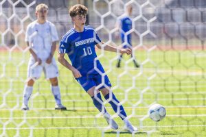 Shorewood’s Niki Genadiev takes a penalty kick during the 3A state semifinal game against Ingraham on Friday, May 30, 2025 in Puyallup, Washington. (Olivia Vanni / The Herald)