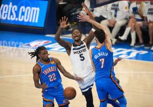 The Timberwolves' Anthony Edwards (5) loses control of the ball in the fourth quarter of Game 5 against the Thunder, after the Wolves had already lost control of the game. (Jeff Wheeler / The Minnesota Star Tribune / Tribune News Services)