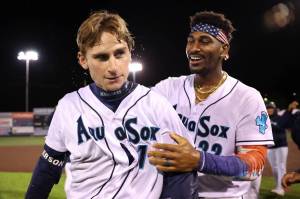 Everett's Colt Emerson (1) celebrates with Lazaro Montes after the infielder's sacrifice fly lifted the AquaSox to a win in the 10th inning at Funko Field on Thursday, May 29, 2025. (Photo courtesy of Evan Morud / Everett AquaSox)