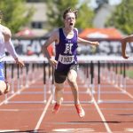 Kamiaks Miller Warme yells as he crosses the finish line in the 4A Boys 110 Hurdles final on Friday, May 30, 2025 in Tacoma, Washington. (Olivia Vanni / The Herald)
