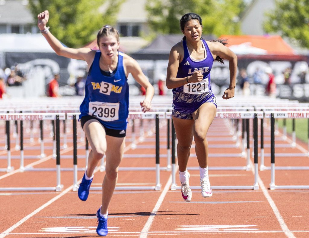 Lake Stevens’ Noelani Tupua runs to the finish line in the 4A Girls 110 Hurdles final on Friday, May 30, 2025 in Tacoma, Washington. (Olivia Vanni / The Herald)