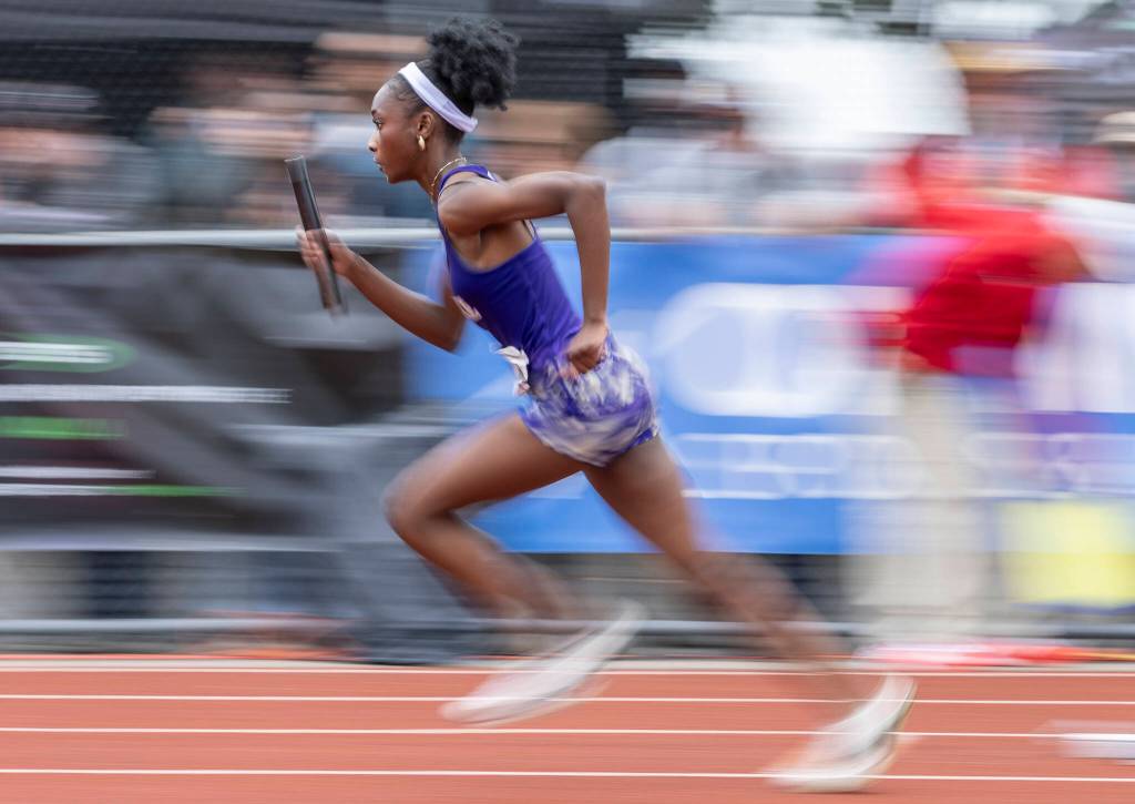 Lake Stevens Haddyjatou Ceesay runs off the starting block in the 4A girls 4x100 relay final on Saturday, May 31, 2025 in Tacoma, Washington. (Olivia Vanni / The Herald)