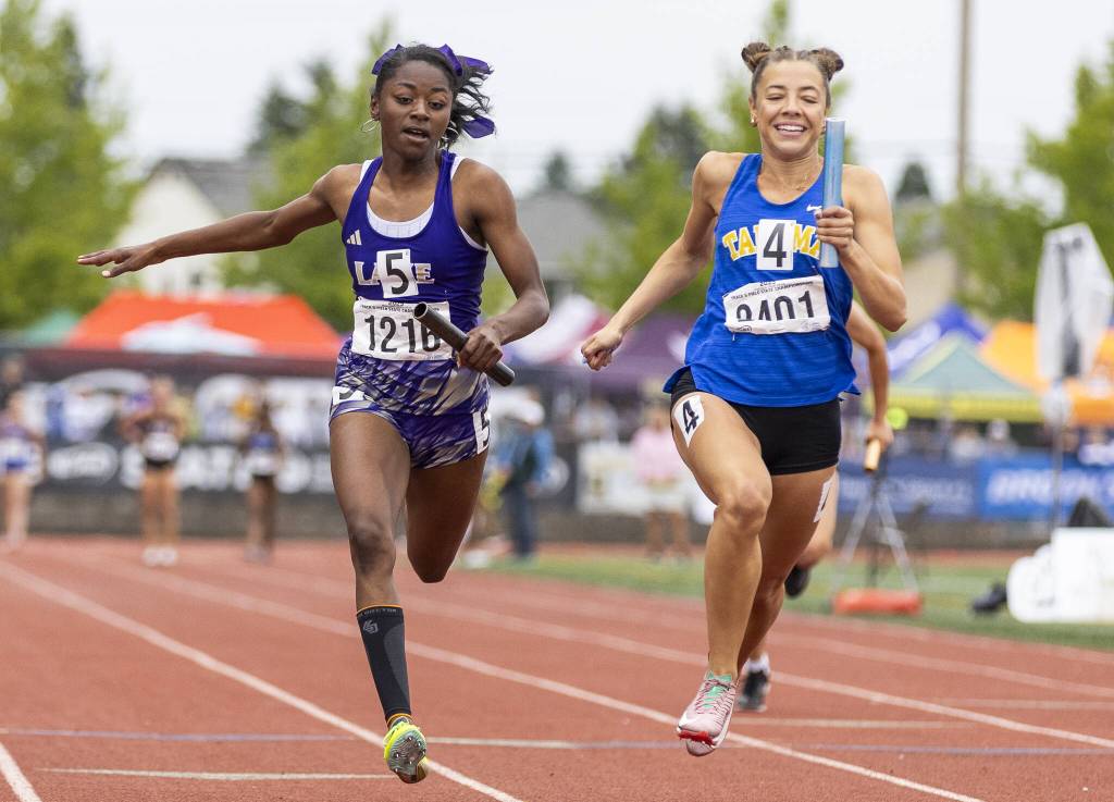 Lake Stevens Brianna Tilgham crosses the finish line in the 4A girls 4x100 relay final on Saturday, May 31, 2025 in Tacoma, Washington. (Olivia Vanni / The Herald)