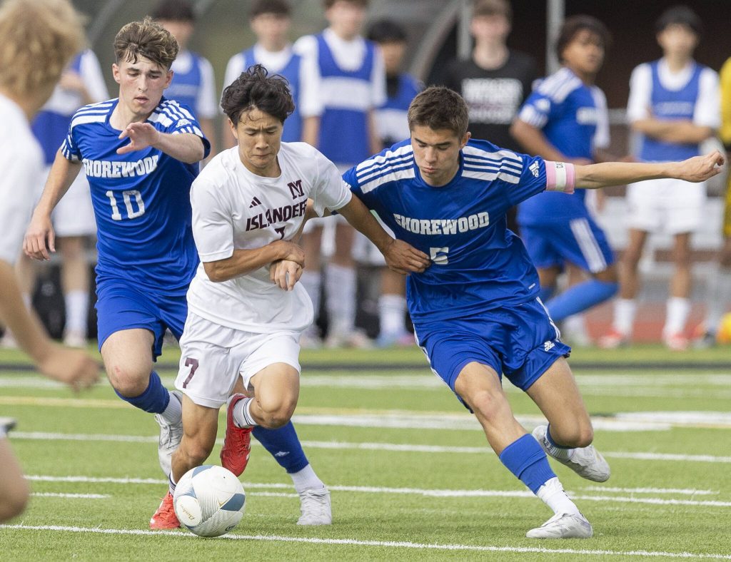 Shorewoods Niki Genadiev and Daniel Bruno runs after the ball during the 3A state championship game against Mercer Island on Saturday, May 31, 2025 in Puyallup, Washington. (Olivia Vanni / The Herald)